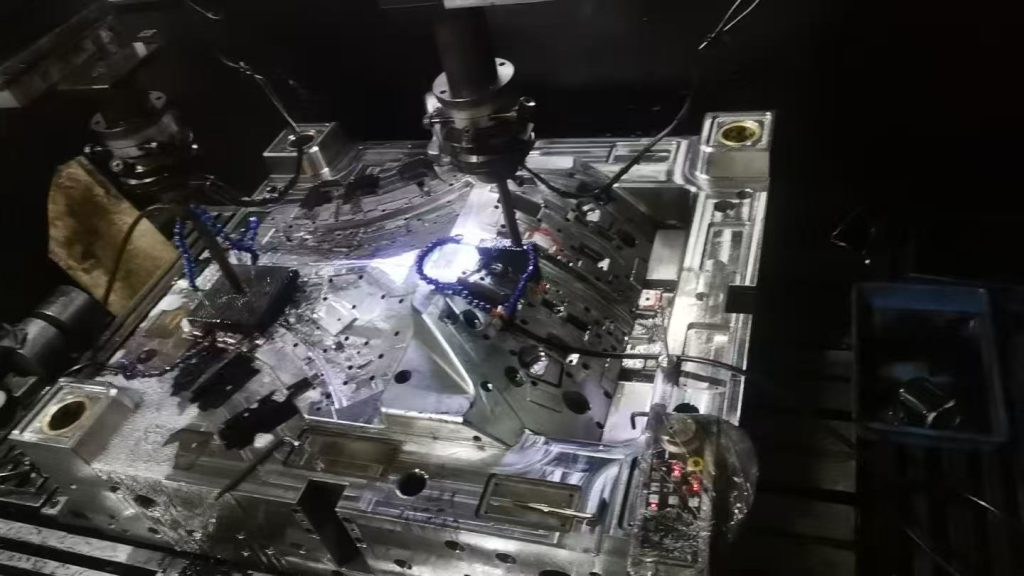 EDM machining process for injection mold core and cavity components with complex features and tight dimensional requirements.