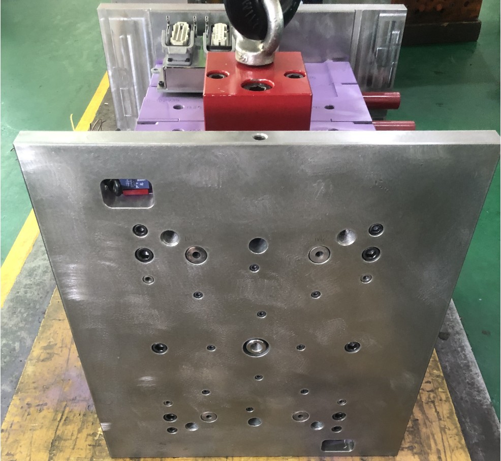 Injection mold cost drivers including cavities, mold steel, slides, cooling, and surface finish