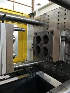 PVC injection molding machine and mold