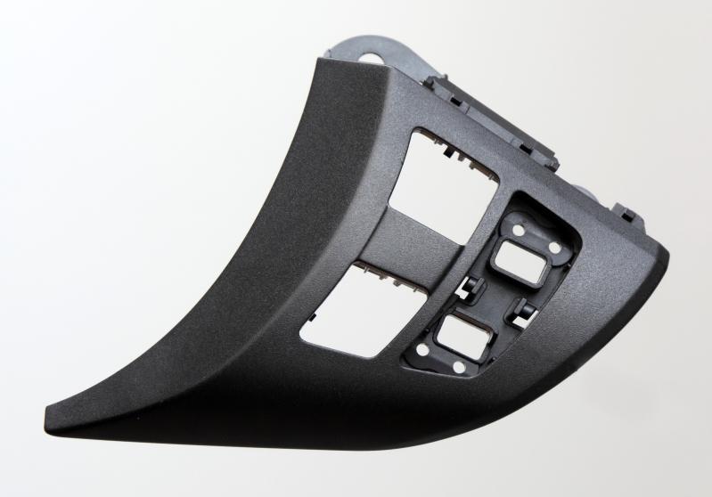 Textured automotive plastic injection molded part requiring proper draft angle