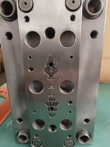 Injection mold return pin problems and ejector system damage prevention