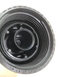 Threaded holes in plastic parts with metal threaded inserts