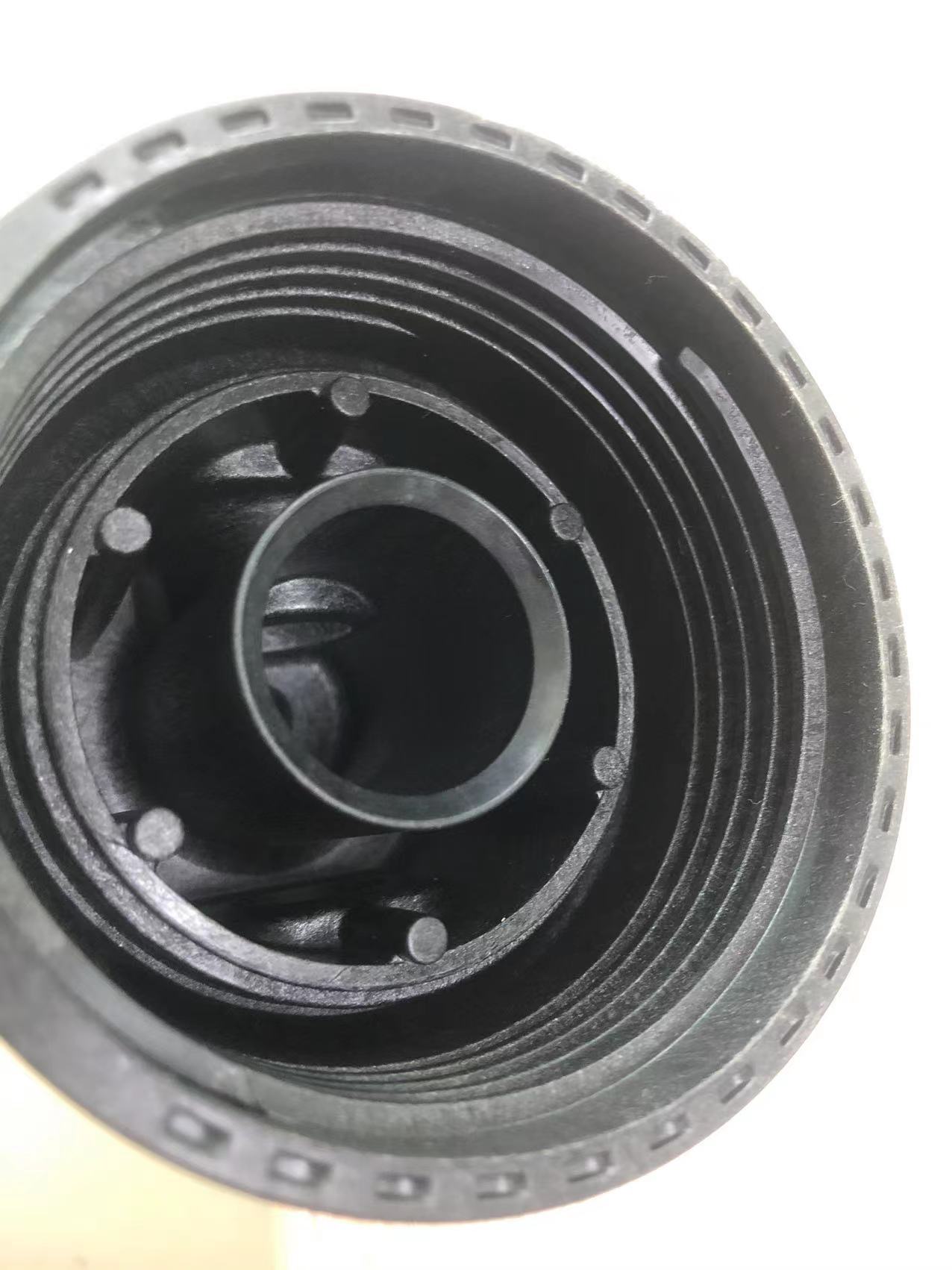 Threaded holes in plastic parts with metal threaded inserts