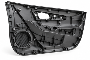 Automotive door panel mold design showing plastic reinforcing ribs, mounting bosses, and structural features to prevent warpage.