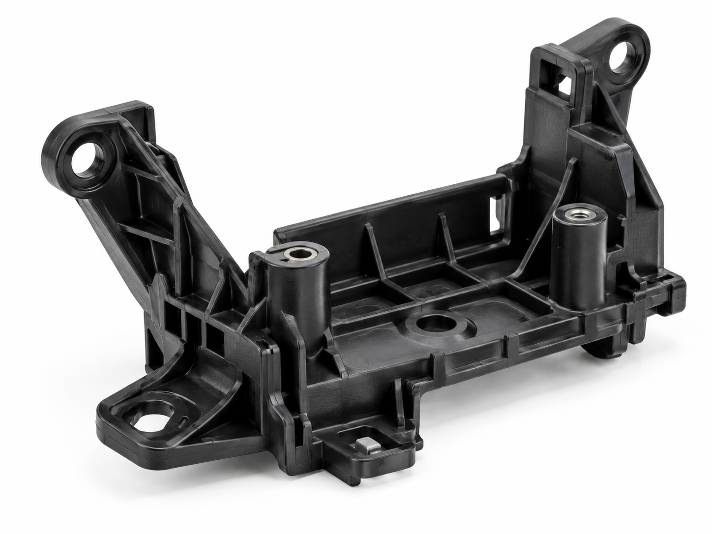 Automotive plastic brackets with reinforcing ribs, mounting holes and screw bosses for improved strength