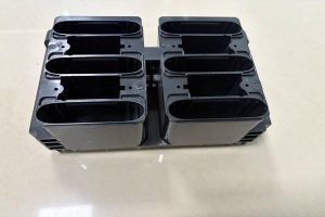 Power bank housing made from injection molded plastic with a smooth surface finish