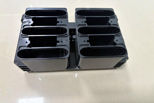 Power bank housing made from injection molded plastic with a smooth surface finish
